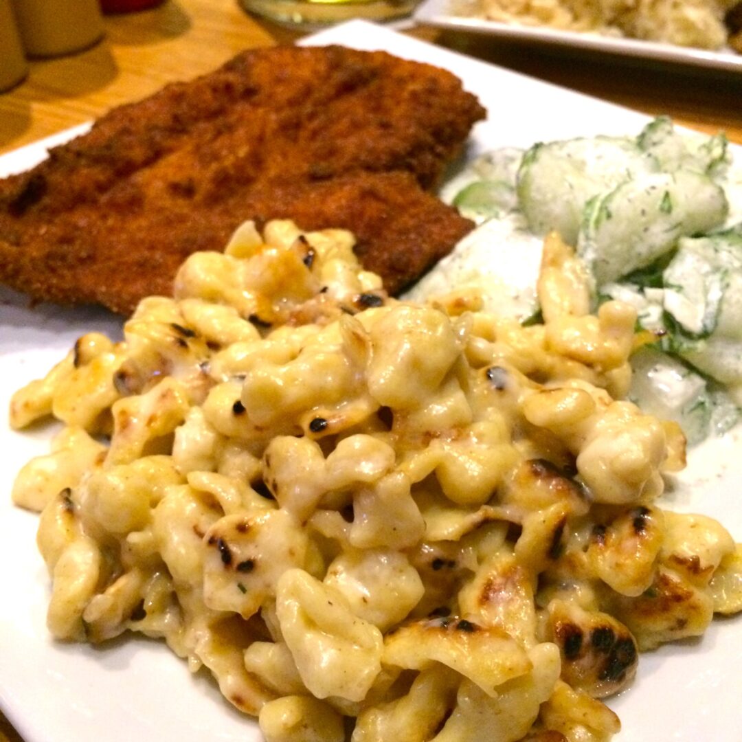 Chicken Schnitzel with a side of mac & cheese and cucumber salad - $15.00