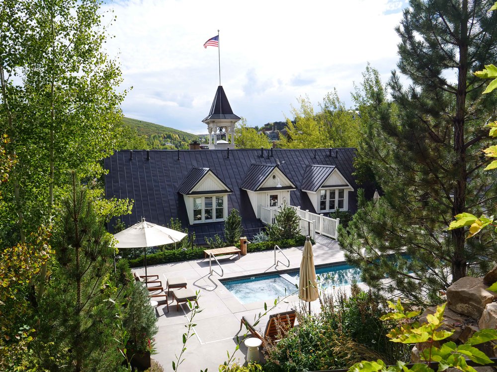 The pool deck. Note the bell town of the hotel from its school house days.