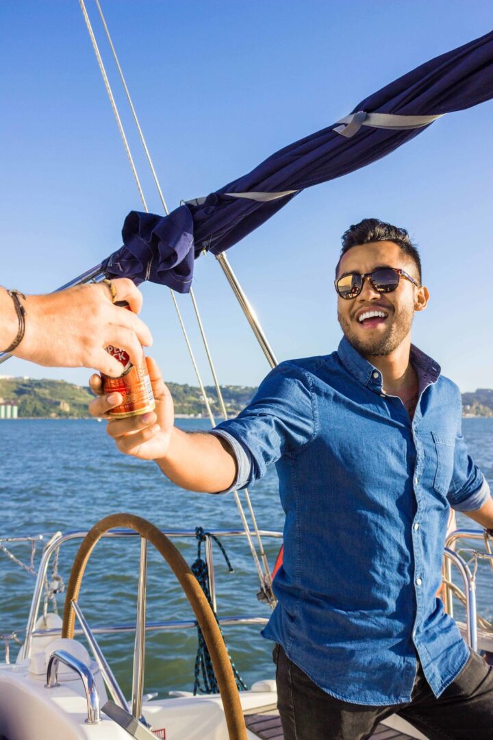 Luis enjoys the beer on the sailing yacht