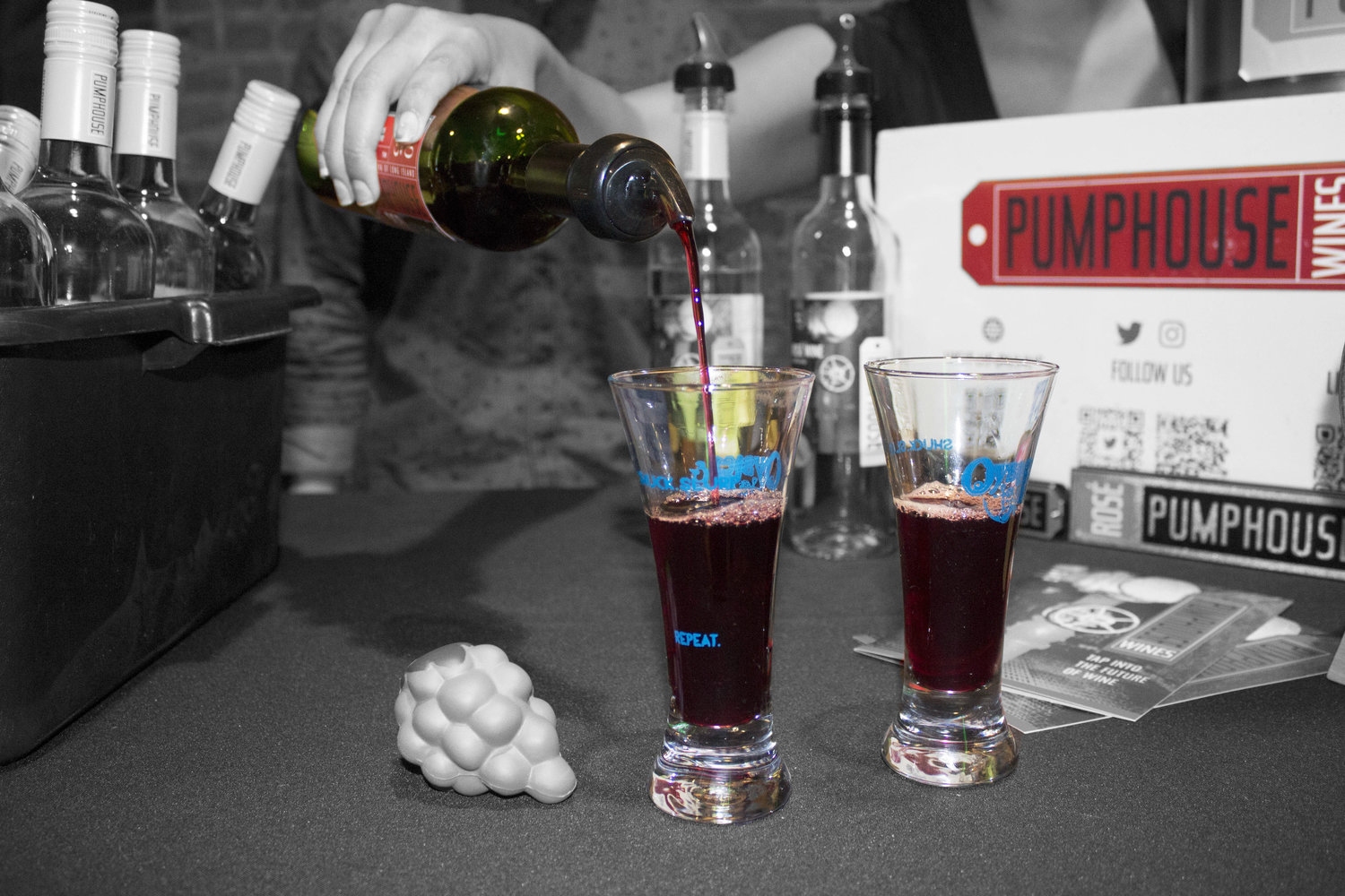 Pumphouse wine is poured into Oyster & Beer Festival signature glasses. 