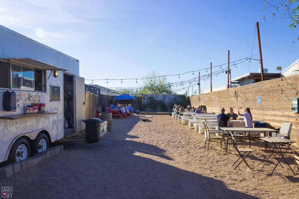 The outdoor space at St. Elmo Brewing Co. has a food truck and several outdoor games (not seen in photo)