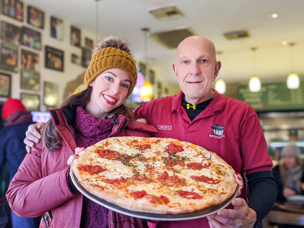 Sarah at Bleecker Street Pizza with the Nonna Maria slice