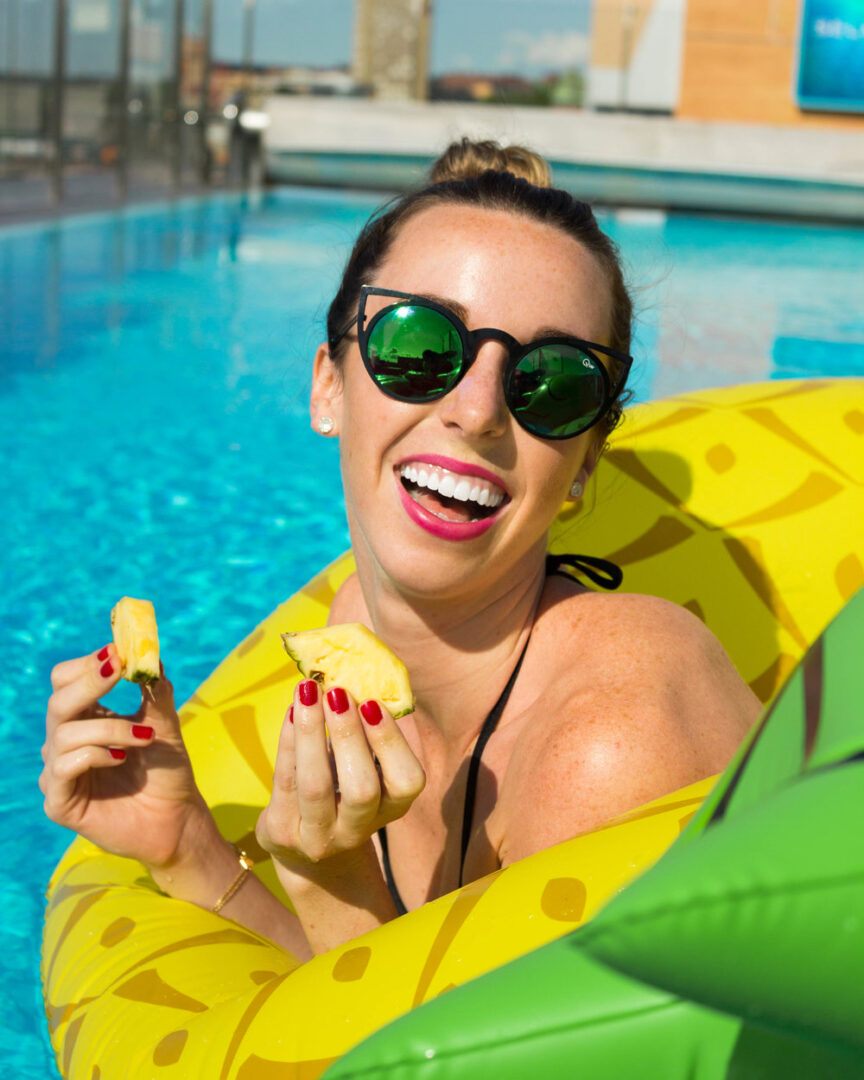 Eating pineapple while sitting in a pineapple floaty = living the dream!