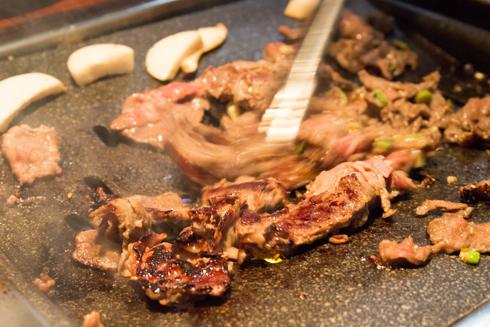 Korean BBQ (beef) is cooked on the tabletop