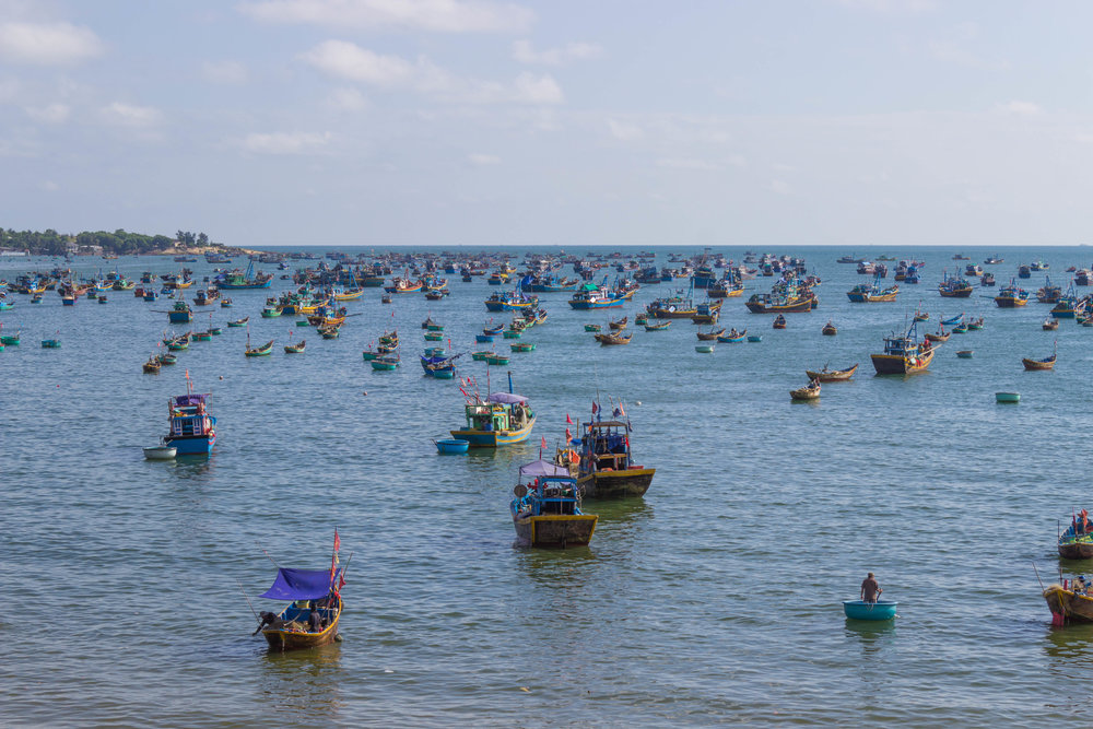 Fisherman boats in the harbor of Mui Ne