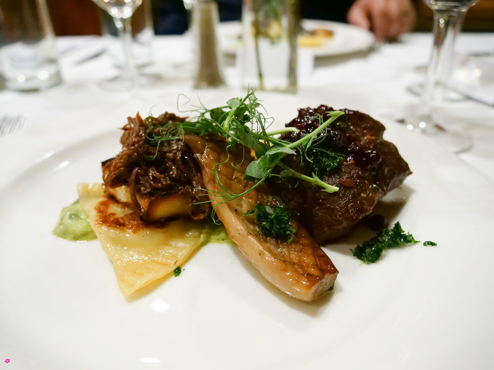 Wagyu Beef Short Rib with trumpet mushroom, huckleberries, oxtail toast and ricotta pierogis from Riverhorse on Main