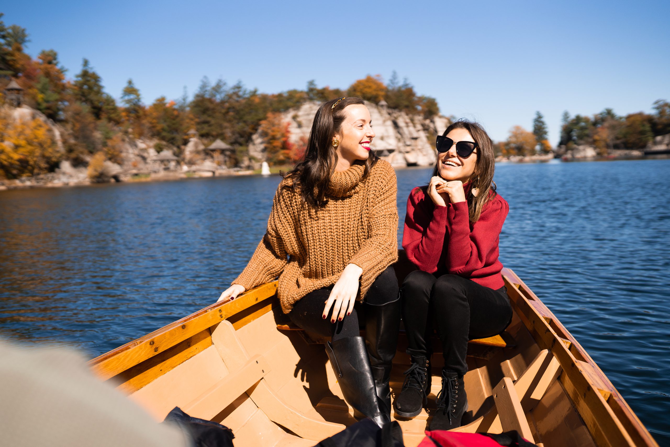 Sarah Funk and Laura Peruchi on row boats near Mohonk Mountain House. 