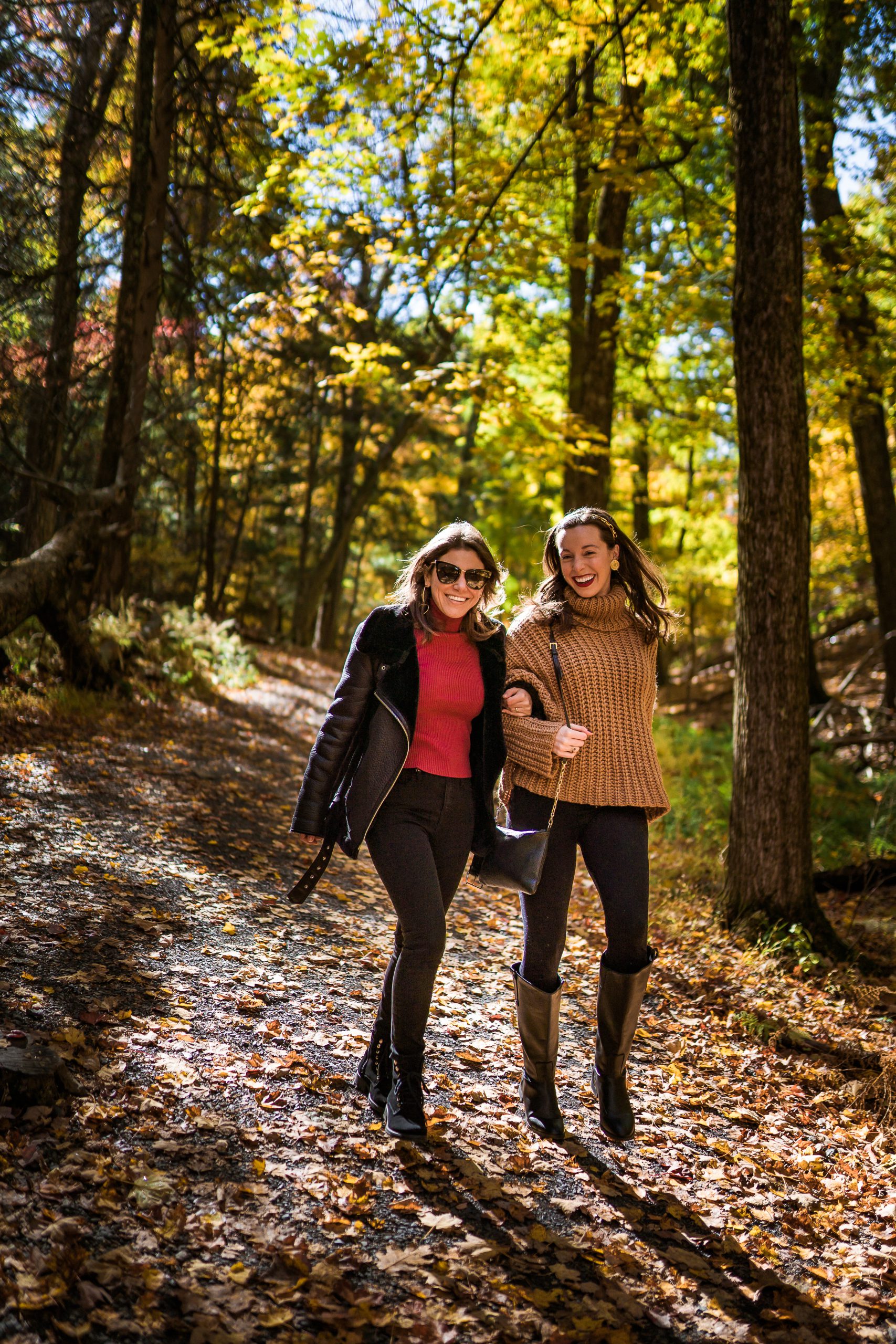 Sarah Funk and Laura Peruchi walking through the main trail.