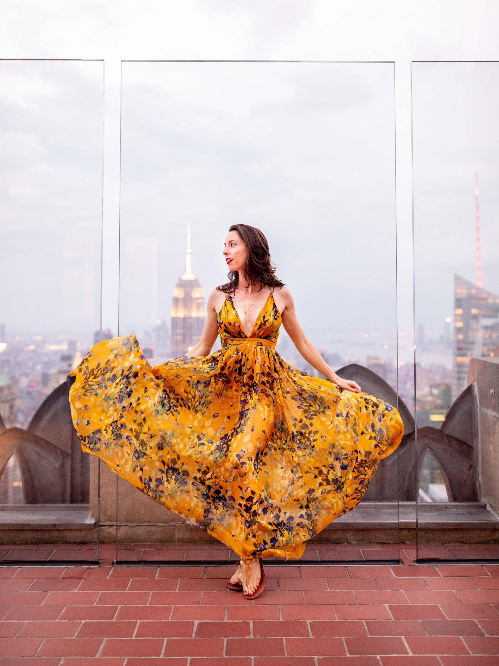Sarah Funk at Top of the Rock - yellow womens dress