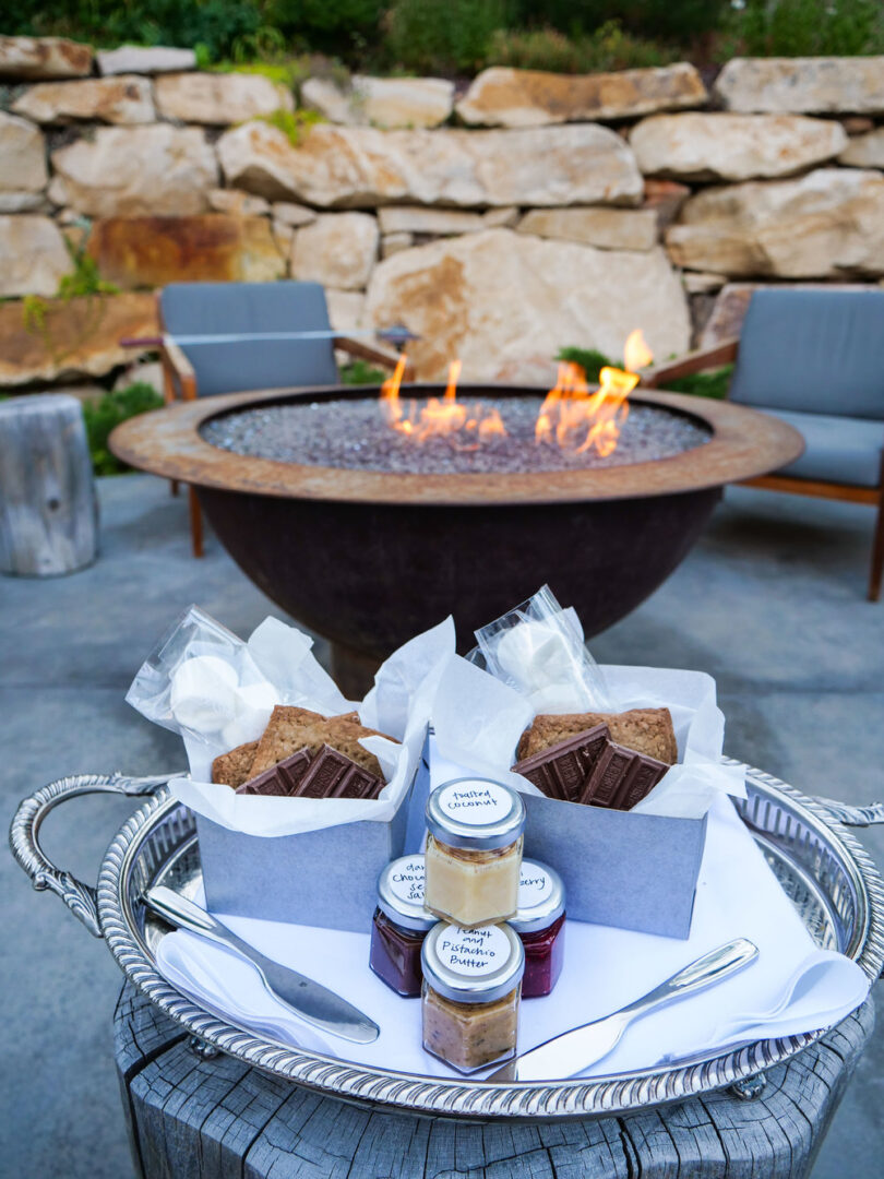 Homemade graham crackers, marshmallows, chocolate and homemade spreads to put on the s'mores.